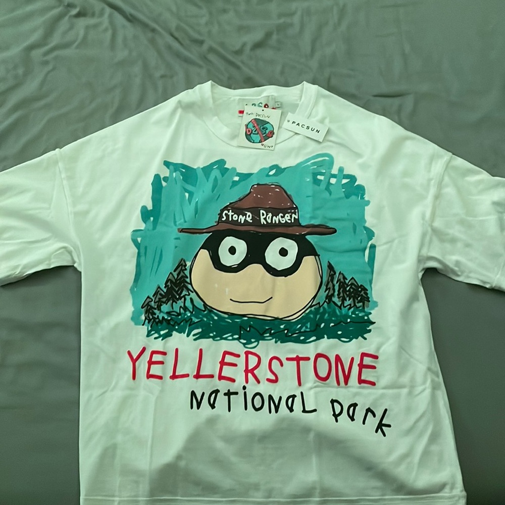This is a white b2ss shirt that is brand new.